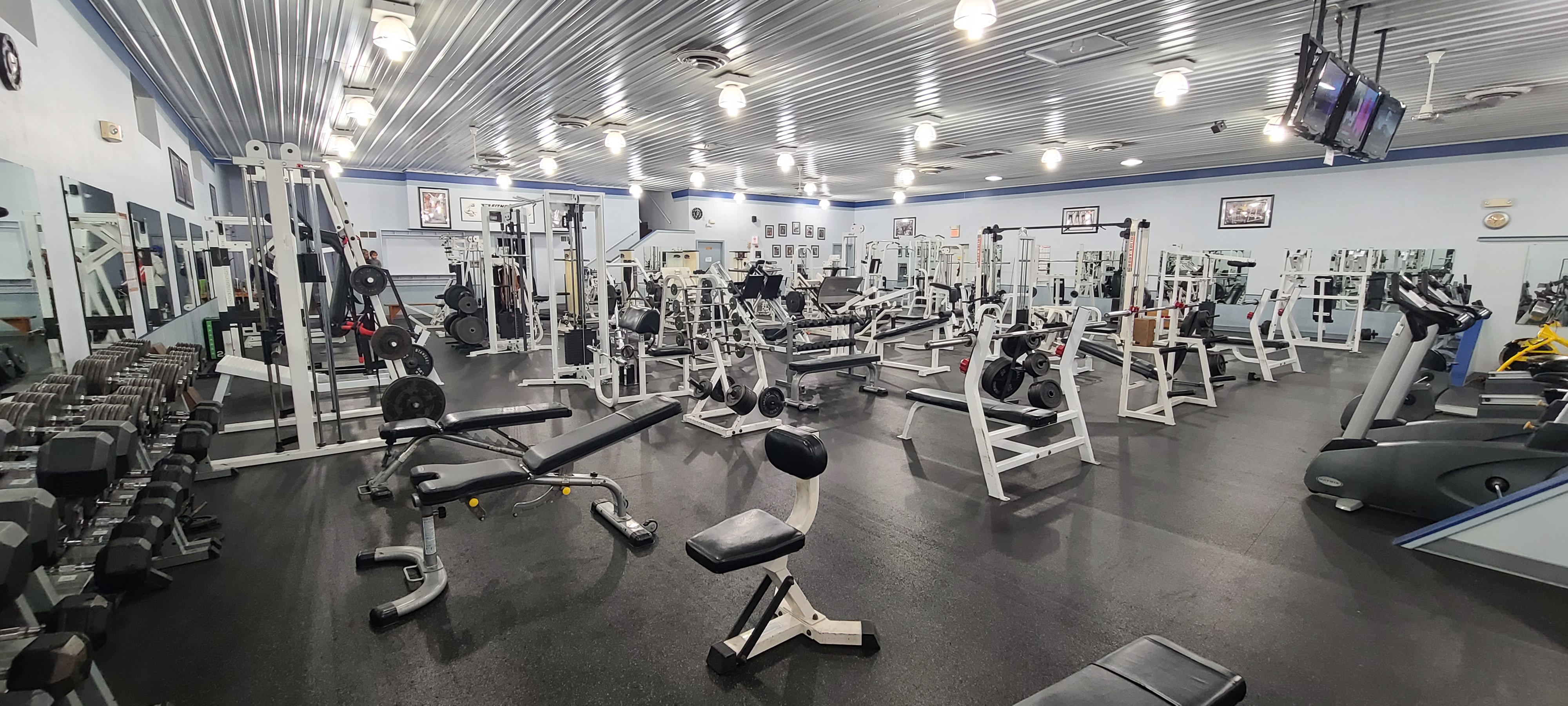 a room of weight training equipment